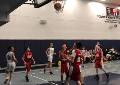 Yeshiva middle school students play basketball